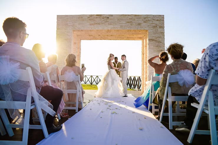 a bride and groom wedding ceremony in paradise