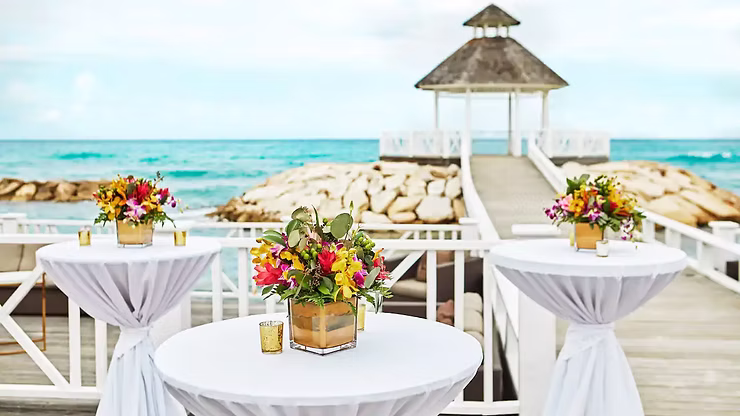 beach wedding set up, table settings at hyatt ziva rose hall in jamaica